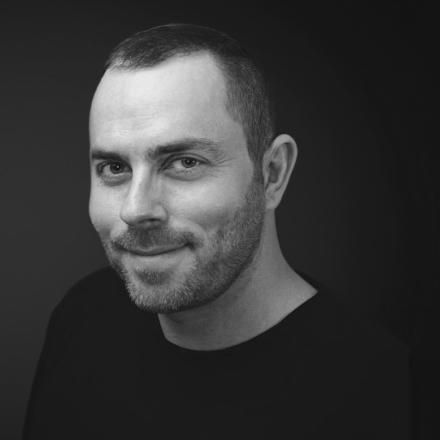 A black and white photo of Brian Solomon