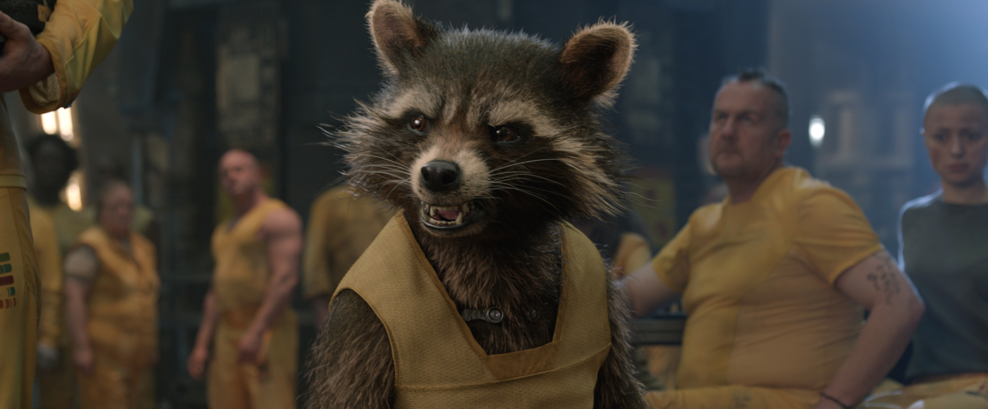 Rocket Raccoon in yellow prison overalls