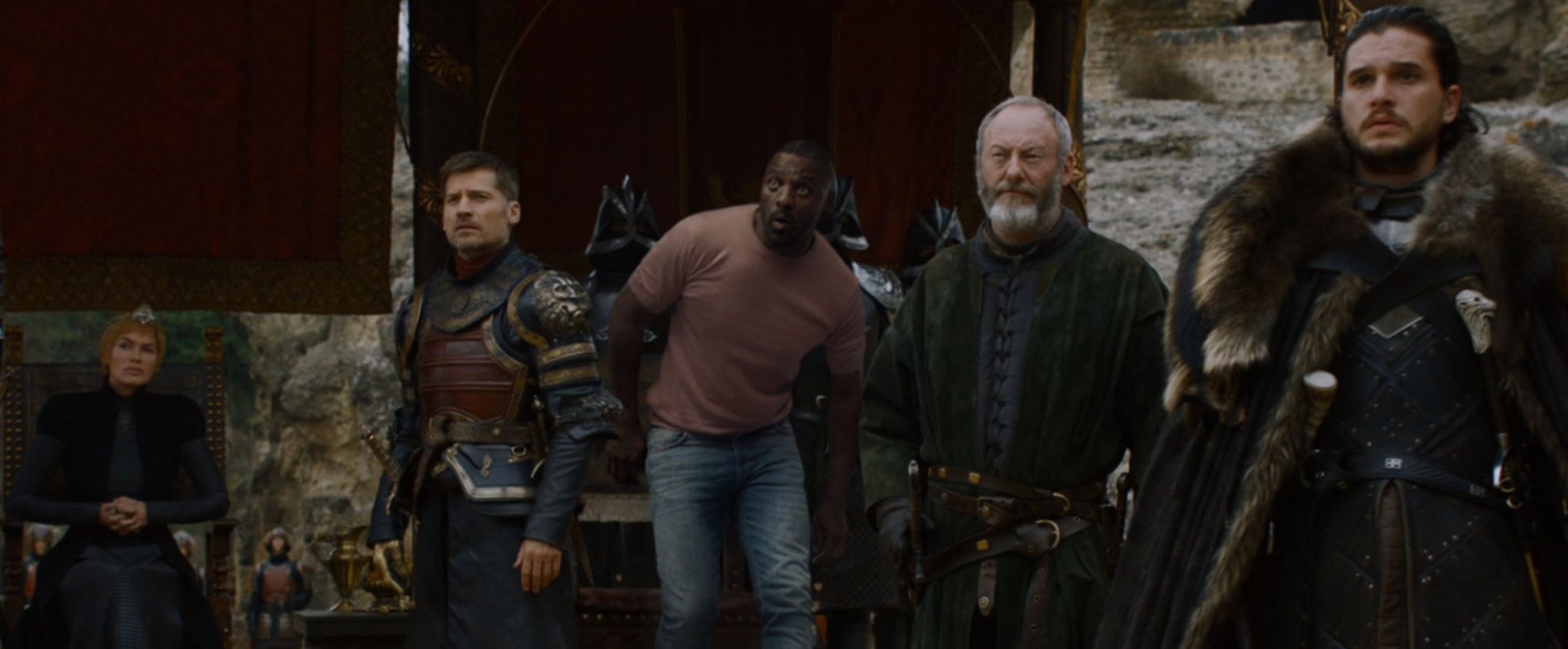 Game of Thrones characters with Idris Elba who is wearing modern current clothing