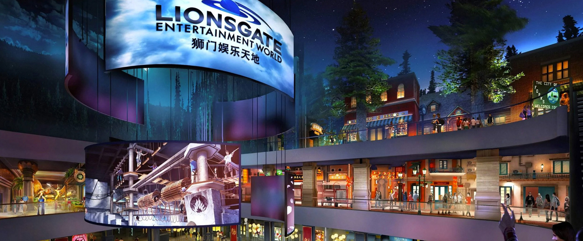 An outdoor retail location with a large electronic billboard showing Lionsgate in black text. There are multiple stories of shops and restaurants with people in.
