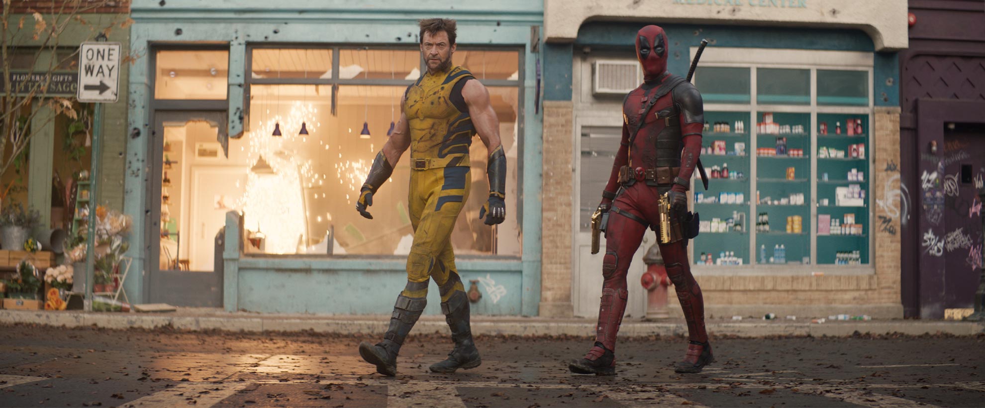 Ryan Reynolds as Deadpool and Hugh Jackman as Wolverine