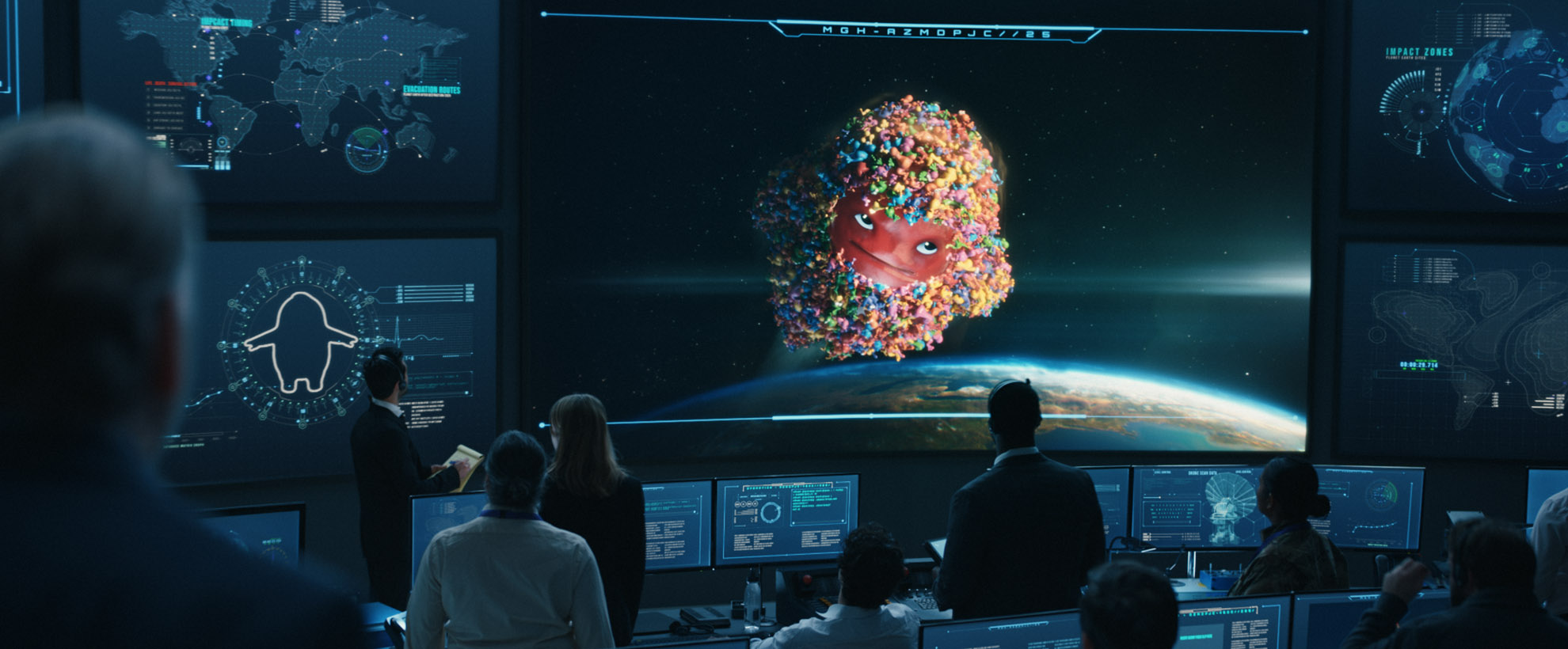 A control room watches as the animated character the Nerds Gummy Monster soars through outerspace