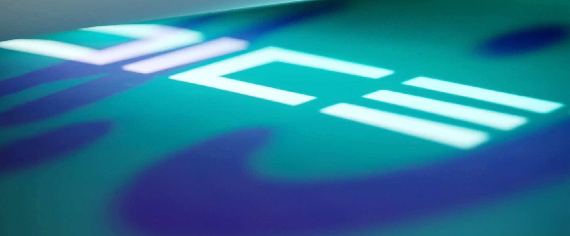 The word DICE written in capital letters in white over a green and blue background.