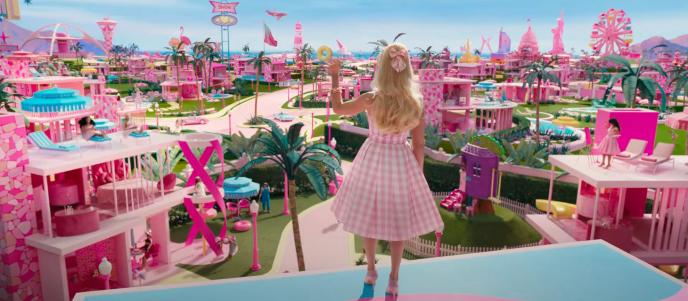 Barbie stands on a roof, overlooking Barbieland