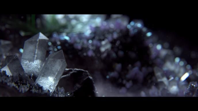 close up shot of two clear crystals in an amethyst