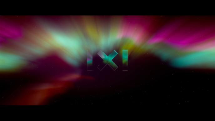 an transluscent 'x' in the centre in front of the twinkling night sky. aurora borealis covers the top