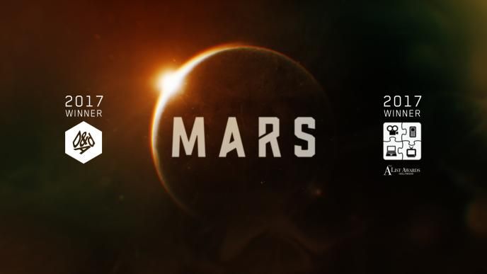 text that reads 'mars' in front of an eclipse. there are two award logos on each side that read '2017 winner' on the top