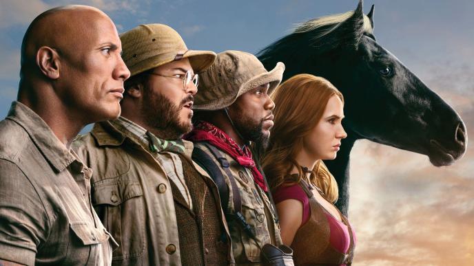 side view of four jumanji characters and a horse standing side by side