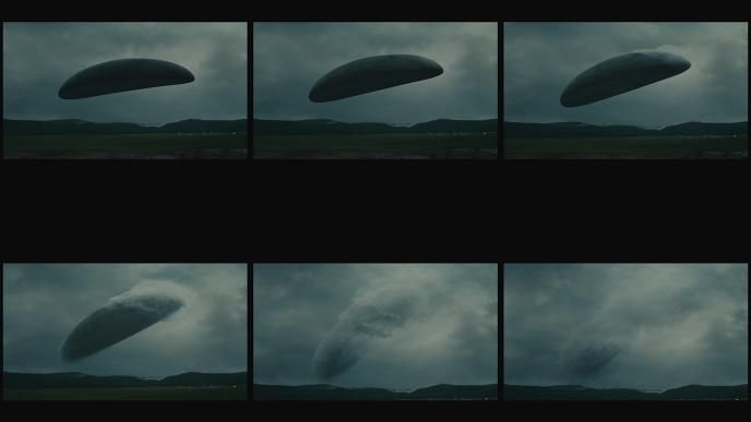 six progress shots of a gigantic extraterrestrial spacecraft appearing and gradually disappearing into the atmosphere amongst the clouds