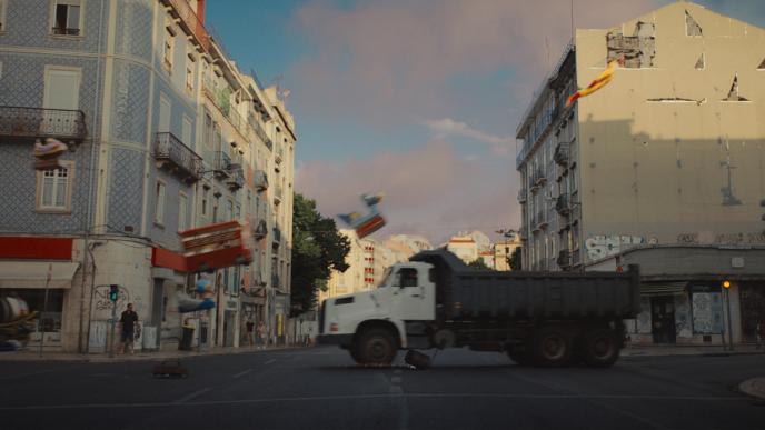 cg animation of classic rides blurred and suspended in air about to crash into a large lorry