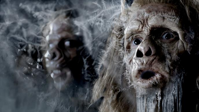 two creatures freezing with icicles forming on their faces that have shocked expressions