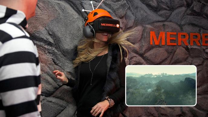 a woman wearing a vr headset in a 4d motion tracked multi-sensory experience