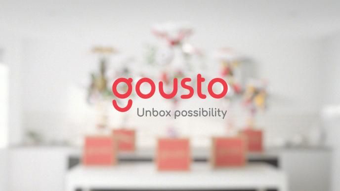 guosto title logo 'unbox possibility' text 