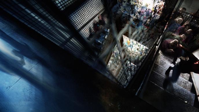 perspective from inside of a fire escape balcony full of zombies