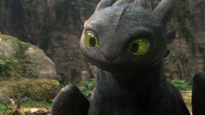 Photo-real CGI Toothless from How To Train Your Dragon cocking his head with curiosity. 