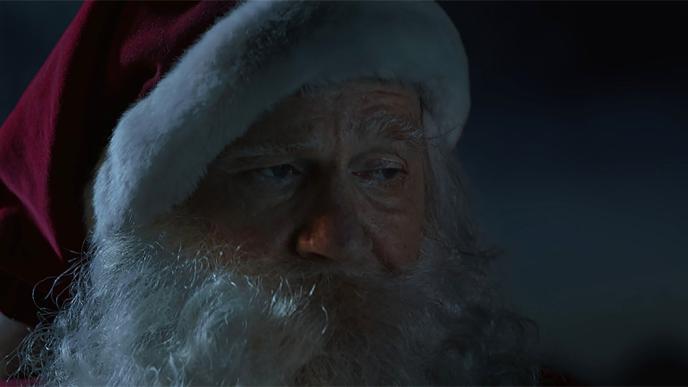 a weary looking santa claus