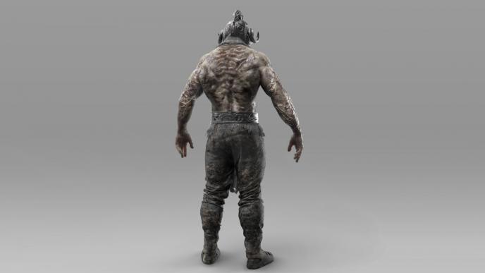 back view of nemesis character wearing a horned shaped helmet and battle trousers