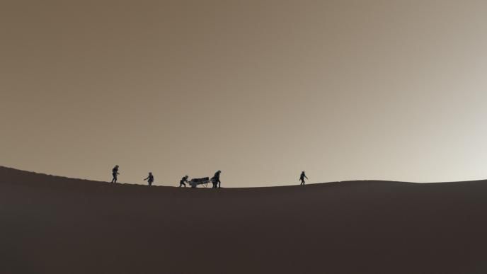 six silhouttes of astronauts walking on the top of a sand dune on mars