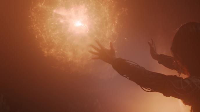 character from the witcher holding her arms out as she creates a fire ball through her palms