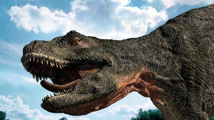 close up detail view of a cg animated t-rex dinosaur looking onwards while roaring. it has huge sharp teeth and scaly skin