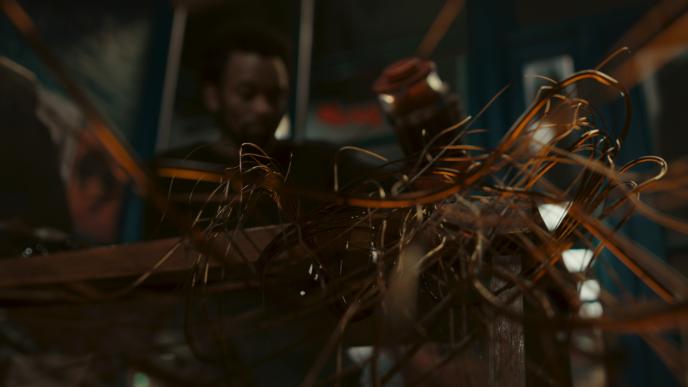 A coffee cup turns into strands of coffee