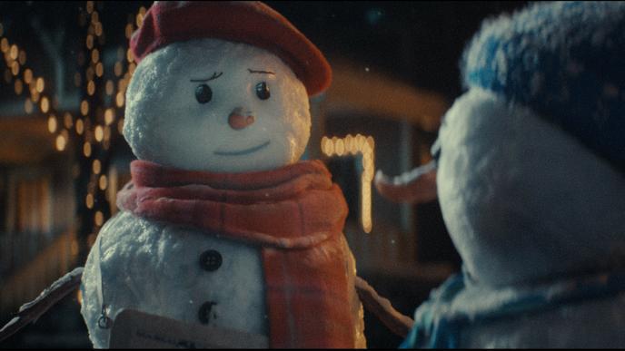 Two snowwomen talk to each other