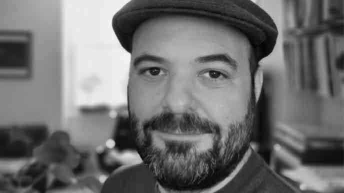 A black and white photo of Jon Allen