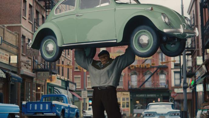 In The Fantastic Four: First Steps, a CGI animated The Thing holds a green car above his head