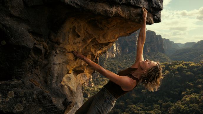 Sasha, played by Charlize Theron, climbing the Australian gorge with final VFX by Framestore