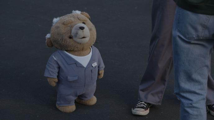 Ted in work suit, beaten up by angry pro-life protesters.