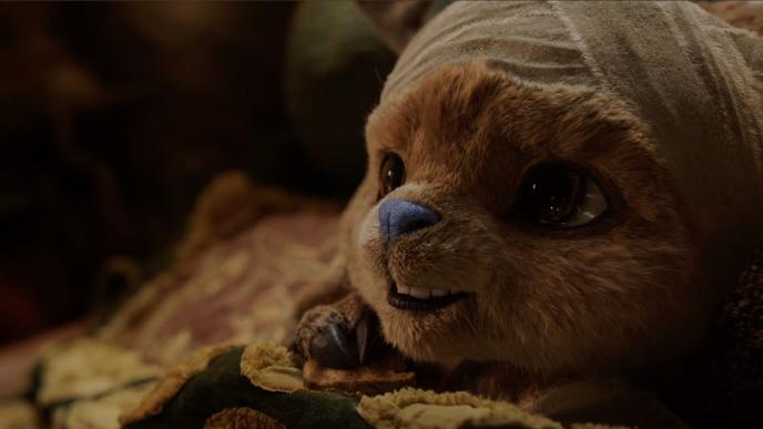 CG Tony Tony Chopper from the live action One Piece lays in bed with a bandage on his head