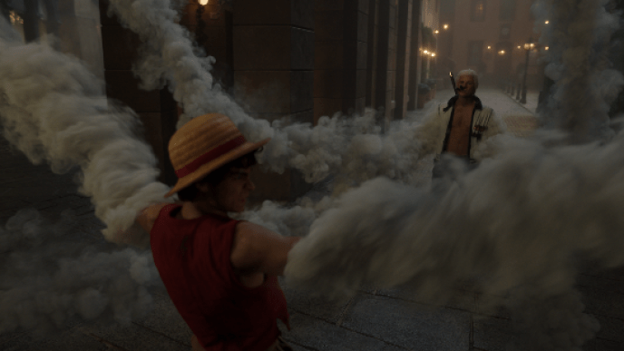 Luffy faces Smoker figure across a foggy street, with thick smoke swirling between them.