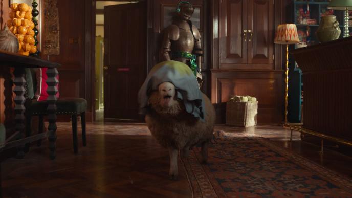 Fully CGI Mopple the sheep runs through the hotel with a pillowcase covering his eyes