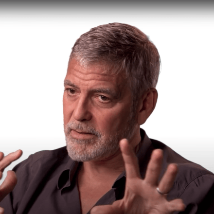 george clooney using hand gestures while talking