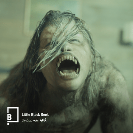 A still from Season 6 Black Mirror episode Mazey Day showing a woman transforming into a werewolf.