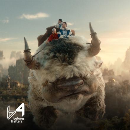 A large flying bison-esque creature carrying three children on is back with a mountainous landscape in the background.