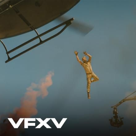 A man jumping from a crane to a helicopter through the air, there is the VFX Voice logo in the bottom left corner.