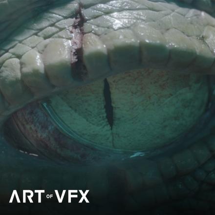 A close up of an alligator's eye with the Art of VFX logo in the bottom left corner. 