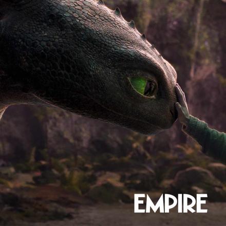 A shot from How To Train Your Dragon (2025), Hiccup reaches out his hand to a CGI Toothless 