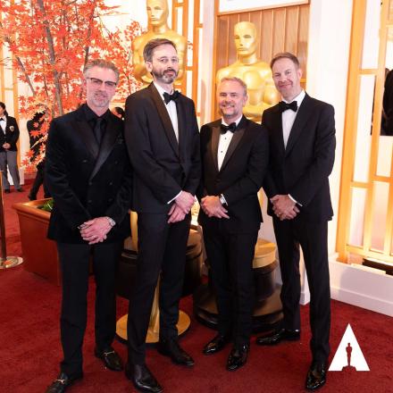 Four men in black tie at the Oscars 2026. Featured in the image are academy award nominees Robert Harrington, Nicolas Chevallier, and Ryan Tudhope.