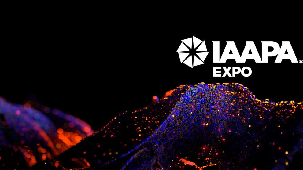 A black background with a purple and orange fluid design along the bottom of the image - there is the IAAPA Europe logo in white to the right hand side. 